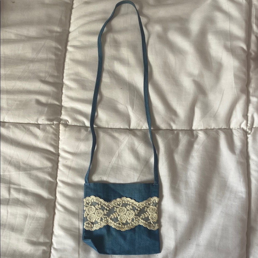 Elegant Blue and Cream Crossbody Bag with Lace Accents